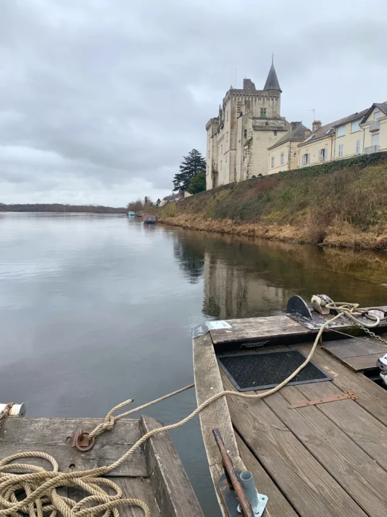 Traditional flat-bottomed boat on the Loire river during a wine tasting tour